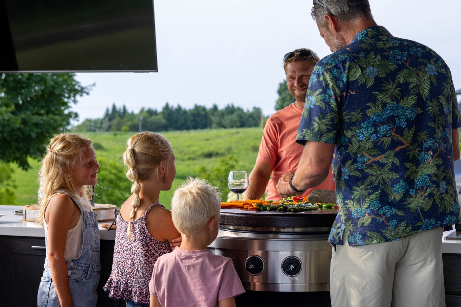 Happy family lifestyle with outdoor kitchen Happy family lifestyle with outdoor kitchen